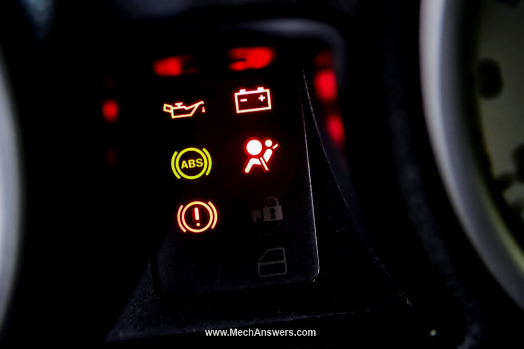 what causes brake light on dash to stay on
